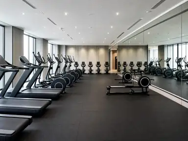 Fitness floor with a row of cardio machines