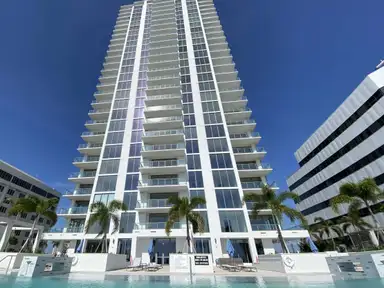 High-rise residential tower and pool deck after a post-construction final clean